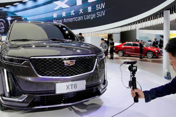 Drivers will be able to converse with an artificial intelligence assistant while cars largely drive themselves in certain situations, the company said. Listen to this article · 3:44 min Learn more Share full article reporter headshot110 Two workers assemble a battery pack on a raised counter in a factory. Battery assembly at a General Motors plant in Spring Hill, Tenn. G.M. announced that it had developed a new lower-cost battery.Credit...Brett Carlsen for The New York Times Jack Ewing By Jack Ewing Oct. 22, 2025 General Motors on Wednesday unveiled new technology features that include an artificial intelligence assistant that people can talk to while they drive, a lower-cost battery and self-driving software that will allow drivers of some cars to take their eyes off the road in some circumstances. The announcements, at an event in New York attended by Mary T. Barra, the G.M. chief executive, seemed designed to show that the company is a technology leader on a par with Tesla and Chinese rivals like BYD. “Together, these innovations signify a fundamental shift in G.M.’s evolution,” the company said in a statement. In the United States, the G.M. brands Cadillac, Chevrolet and GMC are second only to Tesla in electric vehicle sales. Chinese carmakers are effectively banned from the United States by high tariffs. But in Asia and Latin America, G.M. is losing sales to companies like BYD and Geely. Including vehicles powered by gasoline or diesel, G.M. sold about twice as many vehicles worldwide in the third quarter as Tesla did. But Tesla, which is run by Elon Musk, has a stock market value more than 20 times as large as G.M.’s, reflecting investors’ belief that the smaller carmaker is at the forefront of new technologies like autonomous driving. Beginning next year, G.M. said, it will offer Gemini, Google’s A.I. system, in both electric and gasoline vehicles. Drivers and passengers will be able to ask Gemini for restaurant recommendations, directions and information from the owner’s manual for the car.